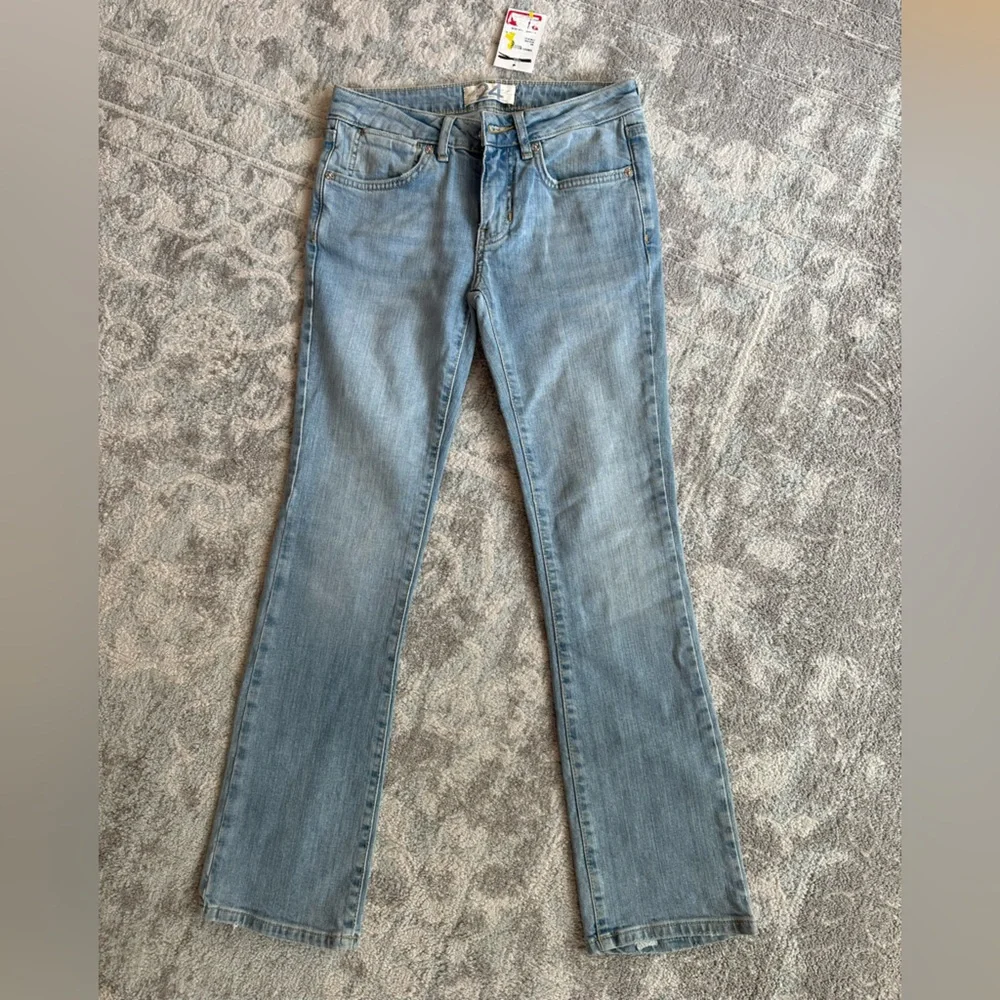 Free People We the Free Etna Blue Cropped Flare Jeans – Size 24 NWT